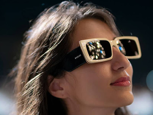 woman wearing Gucci sunglasses