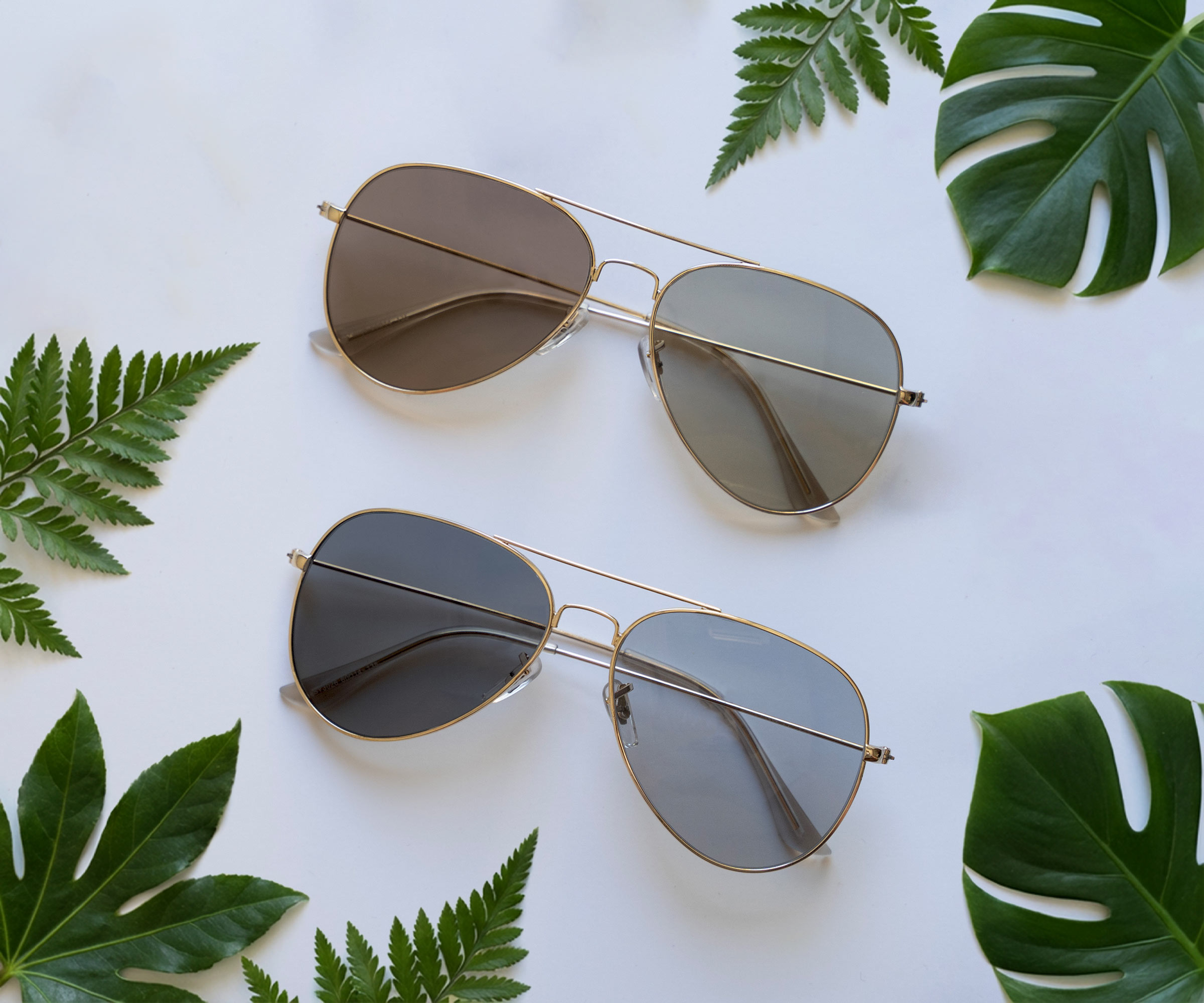 Person wearing sunglasses that adjust to changing light conditions