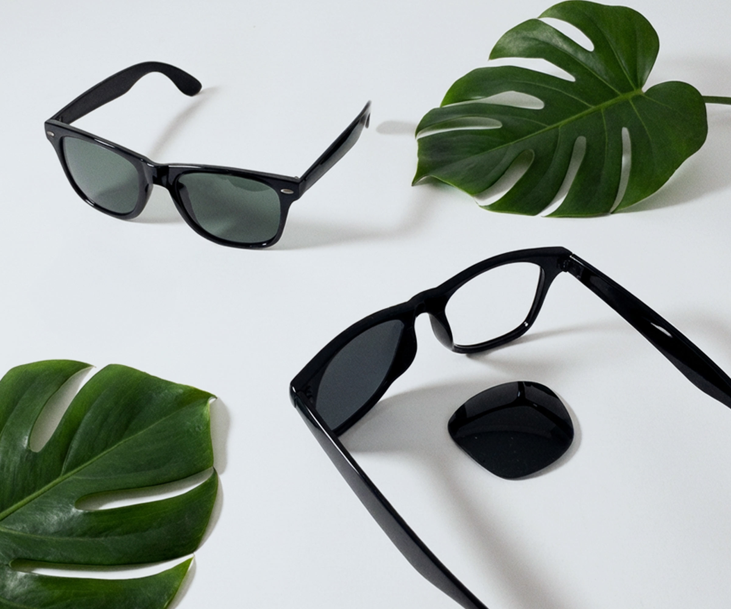 Close-up of a sunglass lens showing its scratch-resistant hardcoat